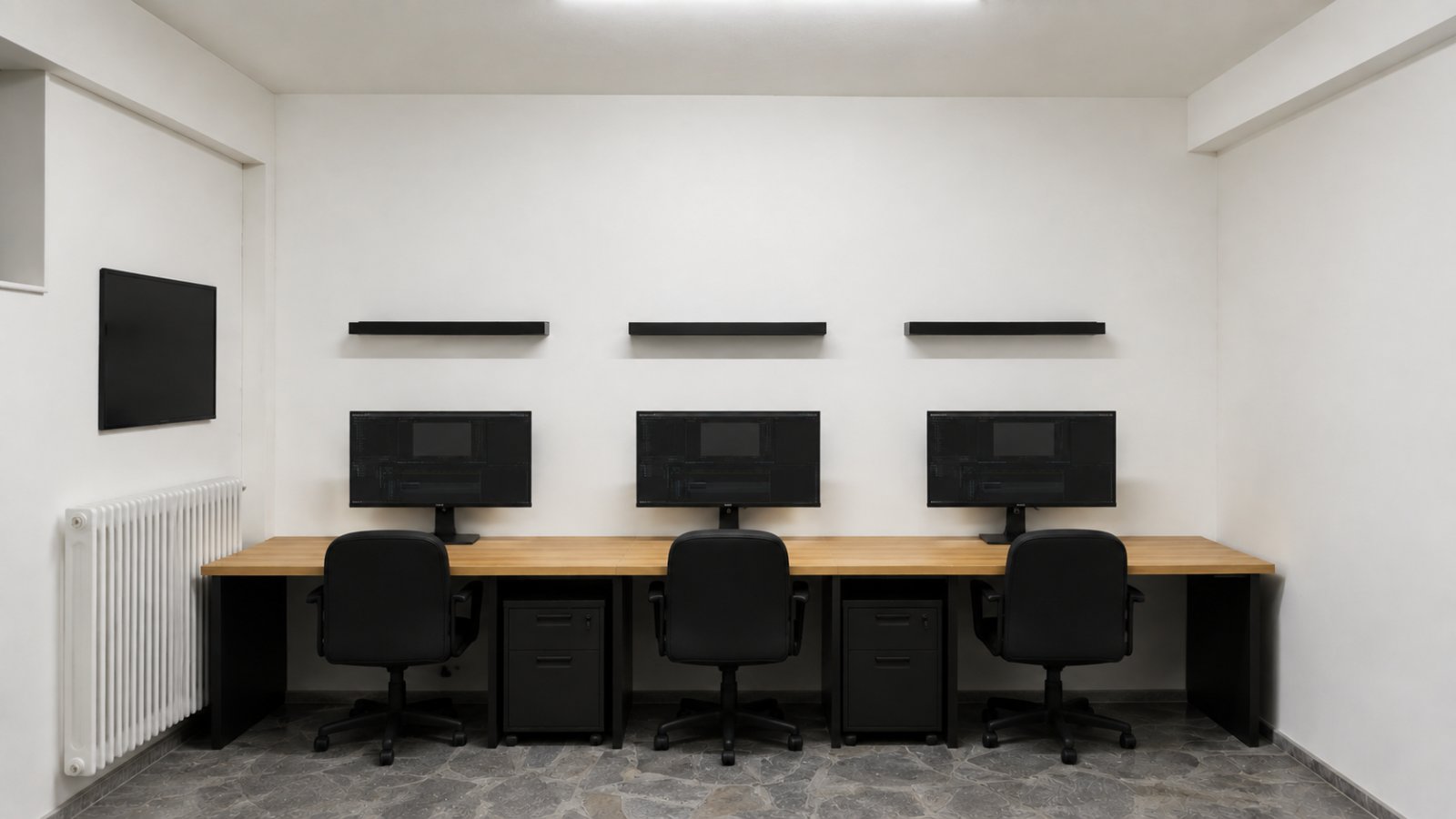Private room with three creative workstations and monitors